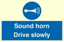 sound-horn-drive-slowly-warehousing-and-delivery-sign~